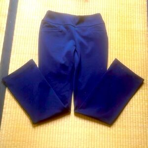 Navy blue pull on slacks with four welt pockets